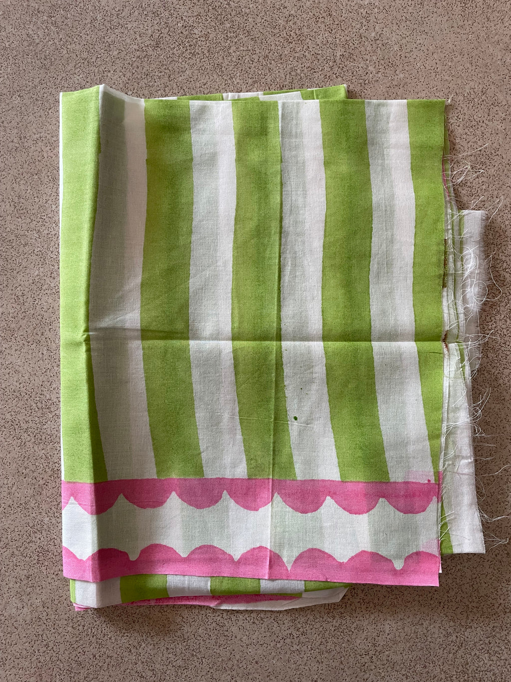 Mogasu’s Toring saree blouse piece with green stripes and pink border.