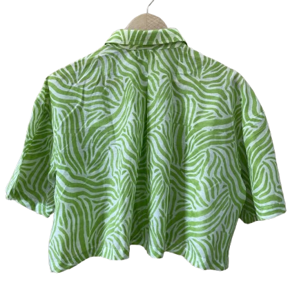 Green and white patterned Mogasu shirt on a hanger against a white background