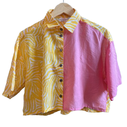 Two-tone yellow and pink Mogasu shirt on a hanger with a visible brand label.