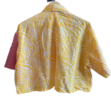 Yellow patterned Mogasu shirt on a white background
