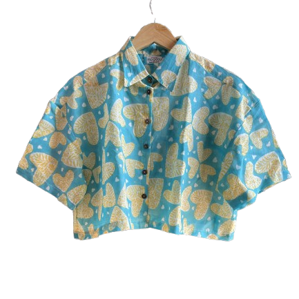 Blue Mogasu shirt with yellow butterfly pattern on a white background